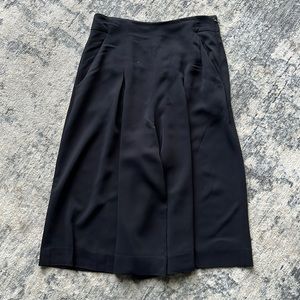 Wide leg black capris with pockets and full leg.